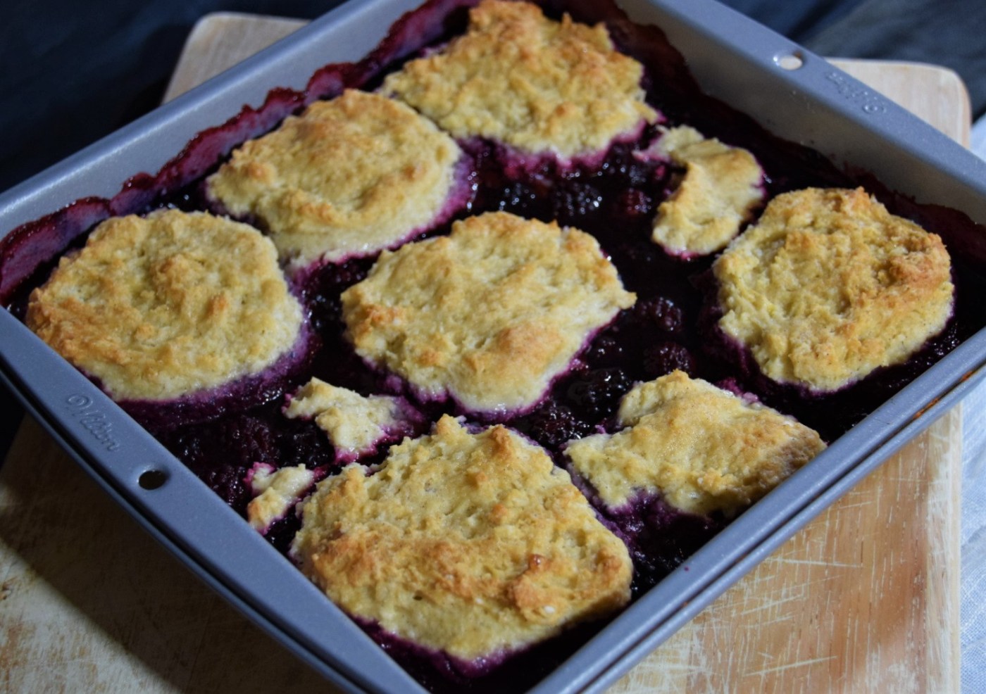 stardew valley blackberry cobbler dish on a wooden cutting board