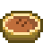 Pixel art of an orange-brown pumpkin pie
